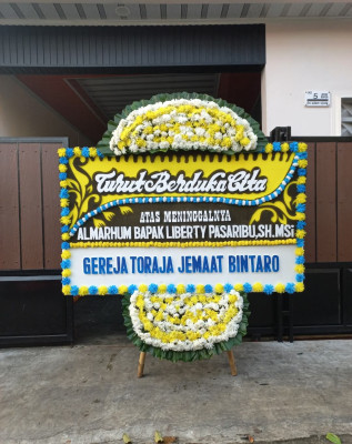 Papan Bunga Duka di Kombeng